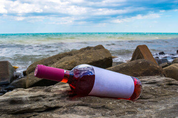 Bottle of wine by the sea