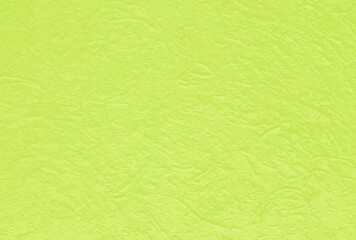 Beautiful green paper with a three-dimensional structure of crumpled paper