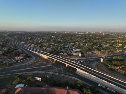 View of a bustling cityscape, overpass bridge 
in Gaborone, Botswana, Africa