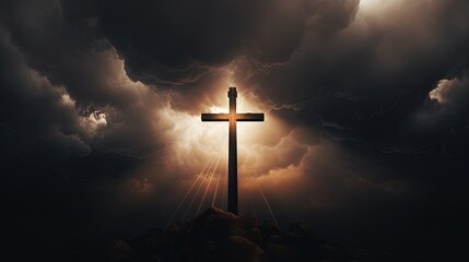 Fototapeta premium Dramatic image showing a religious church cross framed against a moody sky that is beginning to open and pierce light through behind the cross, showing the Lord's presence.