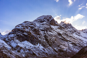 Serene Landscape of snow capped Pir Panjal mountains range during sunset twilight near Rohtang Pass...