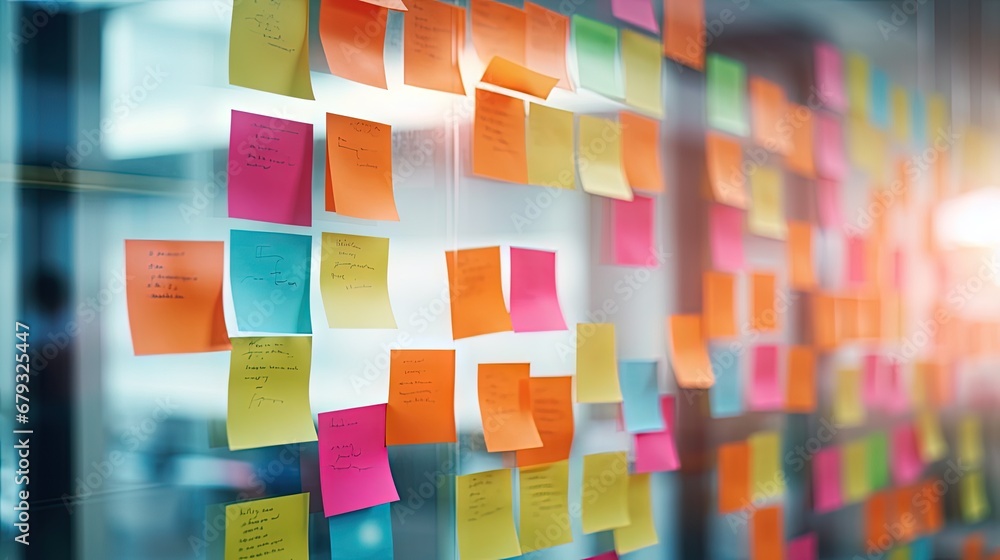 Poster blur color notes or sticky note on the glass wall in the office during brainstorming session in idea