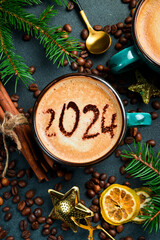 Numbers 2024. Cup of cappuccino with Cinnamon. New Year's decor. On a dark background.