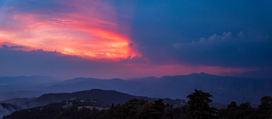 Mesmerizing view of cloudy red sunset sky background during sunset from Dalhousie, Himachal...