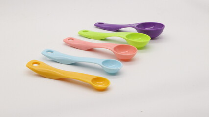 Measuring spoons in various colors