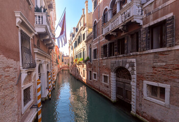 Fototapeta na wymiar Venice. Old stone traditional houses over the canal.