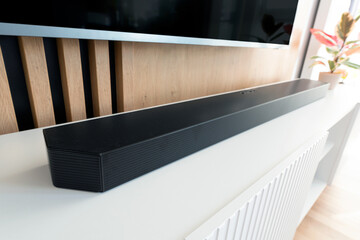 Soundbar device in modern living room