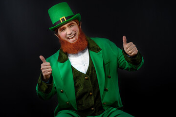 Leprechaun elf on St. Patrick's Day. Cheerful character Irish leprechaun for advertising with a red...