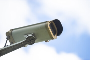 A stock photo of a CCTV (Closed Circuit Television) typically features an image or illustration related to surveillance, security, or monitoring systems. This type of image could include