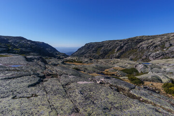 Beautiful rocky landscape of high plateau of Torre with little vegetation on a sunny autumn day, Torre, Serra da Estrela, Portugal