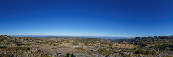 Beautiful panorama of rocky landscape of high plateau of Torre with little vegetation on a sunny autumn day, Torre, Serra da Estrela, Portugal