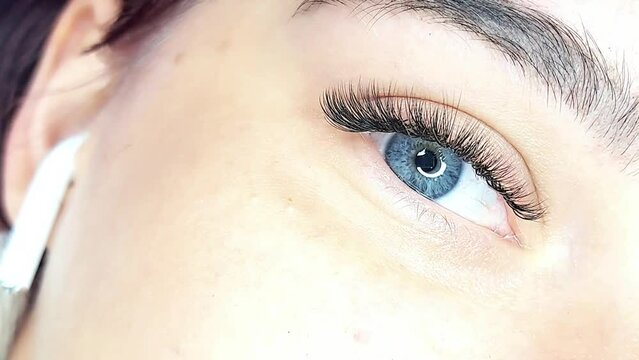 Close up of eye with eyelash extensions ,beauty salon treatment ,2d volume, 3d volume, classical lashes,Russian volume,megavolume, new set.