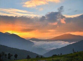 Cloudy sunset over the mountains