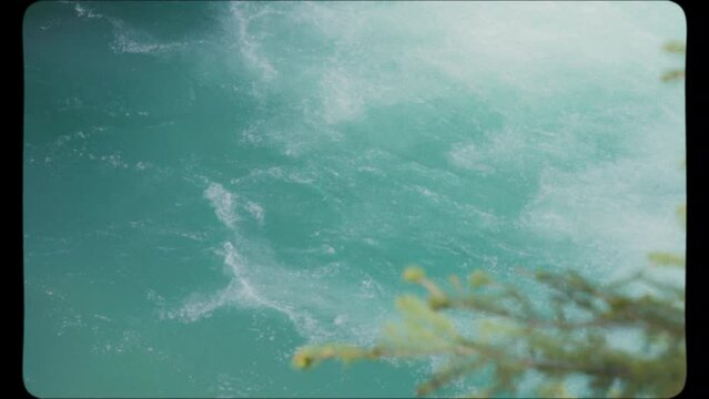 Johnston Canyon turquoise waters in Banff National Park. Vintage Film Look.