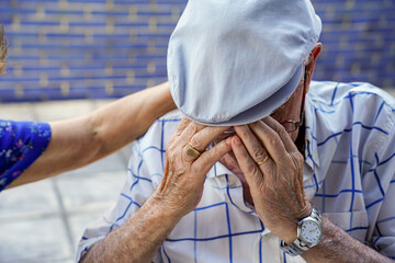 sad and unhappy old man with dementia and emotional problems. Mental health in old age. suicide prevention