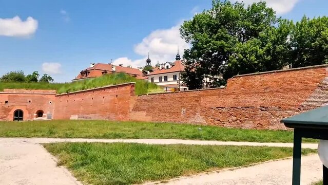 travel from fortifications of the fortress to the market square in the old town in Zamosc, Poland