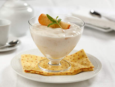 Custard apple and vanilla bavarois served with almond cookies..