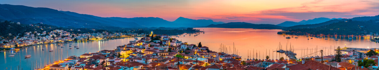 Panoramic view of greek town Poros at sunset, Greece - obrazy, fototapety, plakaty