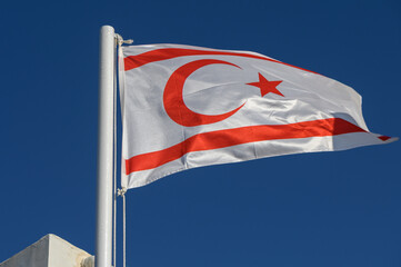 Northern Cyprus flag against blue sky 2