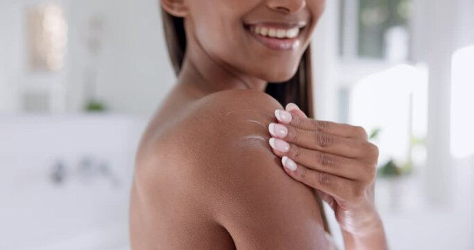 Beauty, woman and hands with cream on body for wellness, luxury and self care in bathroom of home. Cosmetic, person and treatment, lotion or sunscreen for morning routine, apply or glow with smile