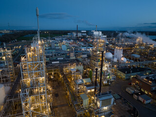 aerial drone view of a polymere production facility in Dordrecht, The Netherlands at night.