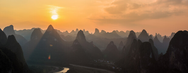 Panoramic landscape sunset scene view from Laozhai mountain on the karsten hills in Guilin,...
