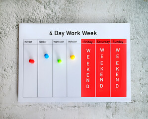Concept of four day work week with paper calendar . Modern business concept 