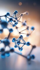 Molecule model with blue glass spheres and gray metal bonds, blurred bokeh background