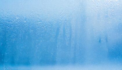 light blue matte surface wet plastic glass frosted winter window glass