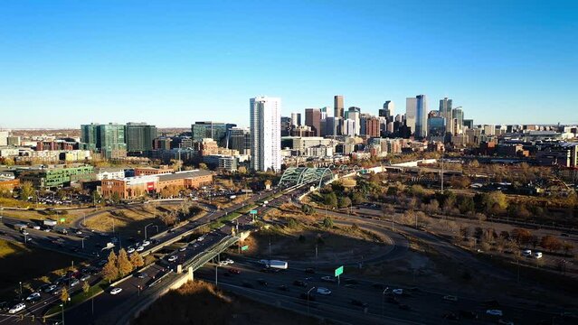 Downtown Denver Skyline and 25 Freeway at Sunset Aerial Shot