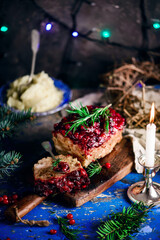 Fototapeta na wymiar Turkey cranberry sauce meat loaf on the Christmas background .style rustic.