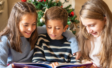 Three Little Readers, Aged 8, Delve Into The Fantasy Of A Story, Filling The Room With Contagious...