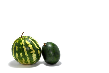 two small green watermelons on a white background