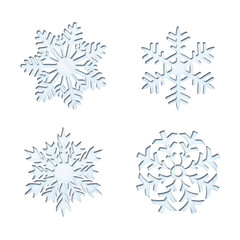 Decorative snowflake shapes with isolated paper cutout effect