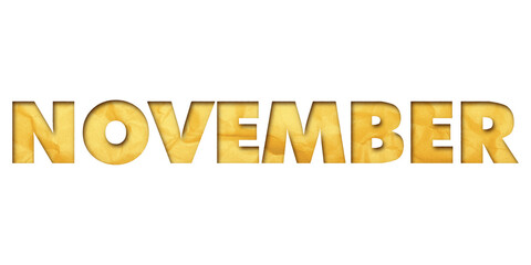 ‘November’ written in isolated paper cutout effect revealing gold crumpled paper background