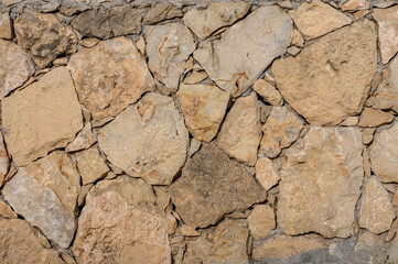 fence made of real stone as a background 2