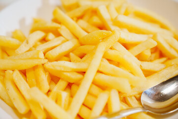 A plate of french fries. favorite fast food food.