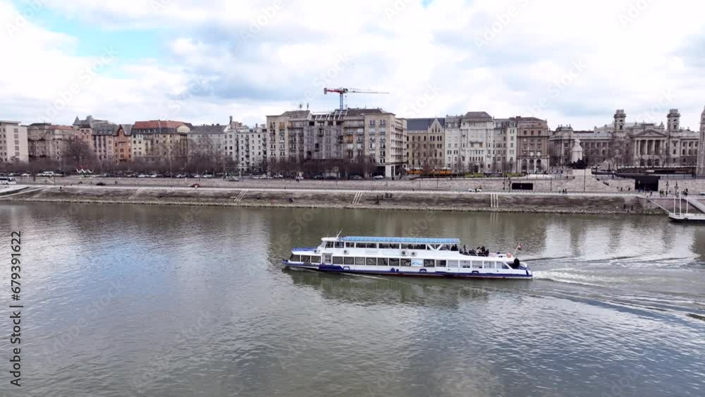 Wall mural Danube River Ferry Cruises in Budapest, Boat Tours. Hungary. Parliament in Background