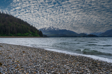 Icy Strait Point, Hoonah, Alaska. Rocky shore of Chichagof Island and bay. 