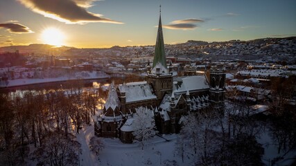 a view of an old, old - fashioned church in winter, Norway
