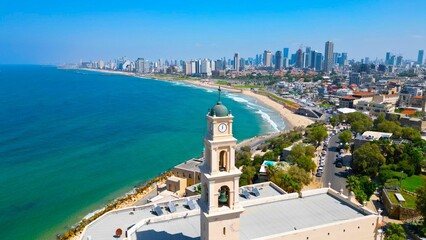 Aerial view of the old city tower in Israel, overlooking the horizon of the city of Tel Aviv - obrazy, fototapety, plakaty