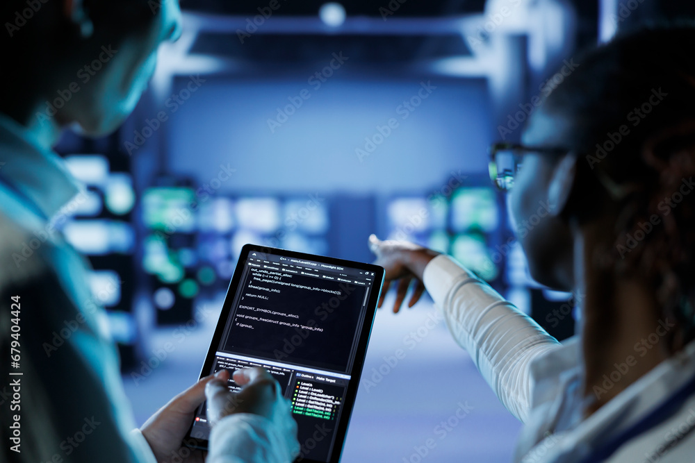 Poster qualified technicians building firewall systems in server room housing advanced infrastructure. cert