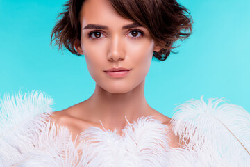 Photo of stunning gentle lady in feather dress on holiday party event isolated over cyan color...