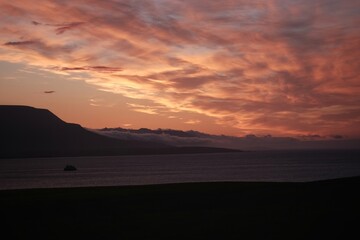 sunset in the mountains by the sea