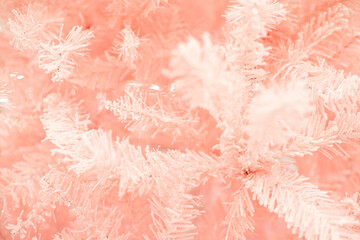 Pink Christmas tree background, selective focus, close-up