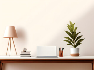 An elegant home office with a minimalist desk a lamp and a large leafy indoor plant.