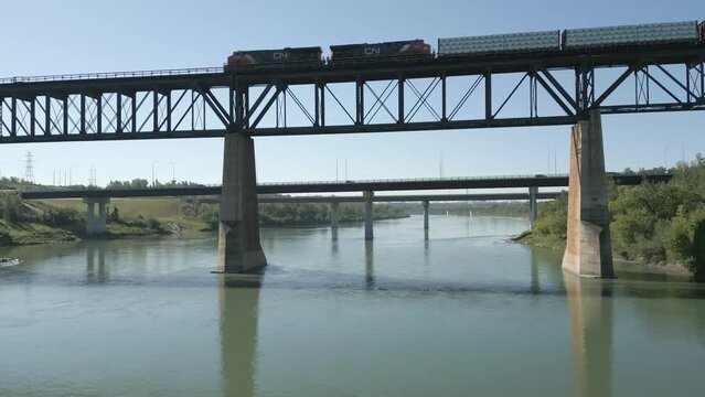 Train sits on the tracks of the 1908 train bridge in Edmonton