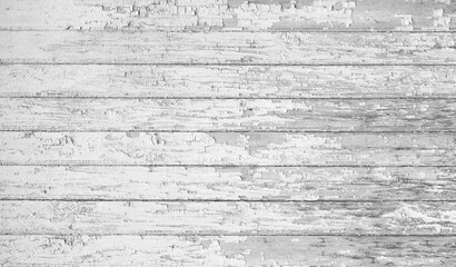 Black and white rough paint finish on white wood planks. Aged reclaimed barn wood.       