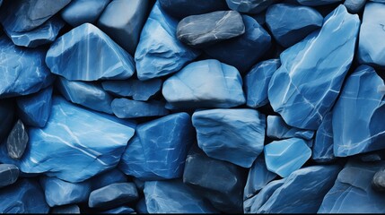 Close-up of blue stones with light reflecting off their marbleized textures