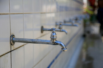 itaparica, bahia, brazil - october 13, 2023: taps seen in a spout on Itaparica Island.